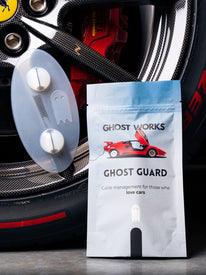 Ghost Works Ghost Guard packaging with Ferrari Wheel in the background
