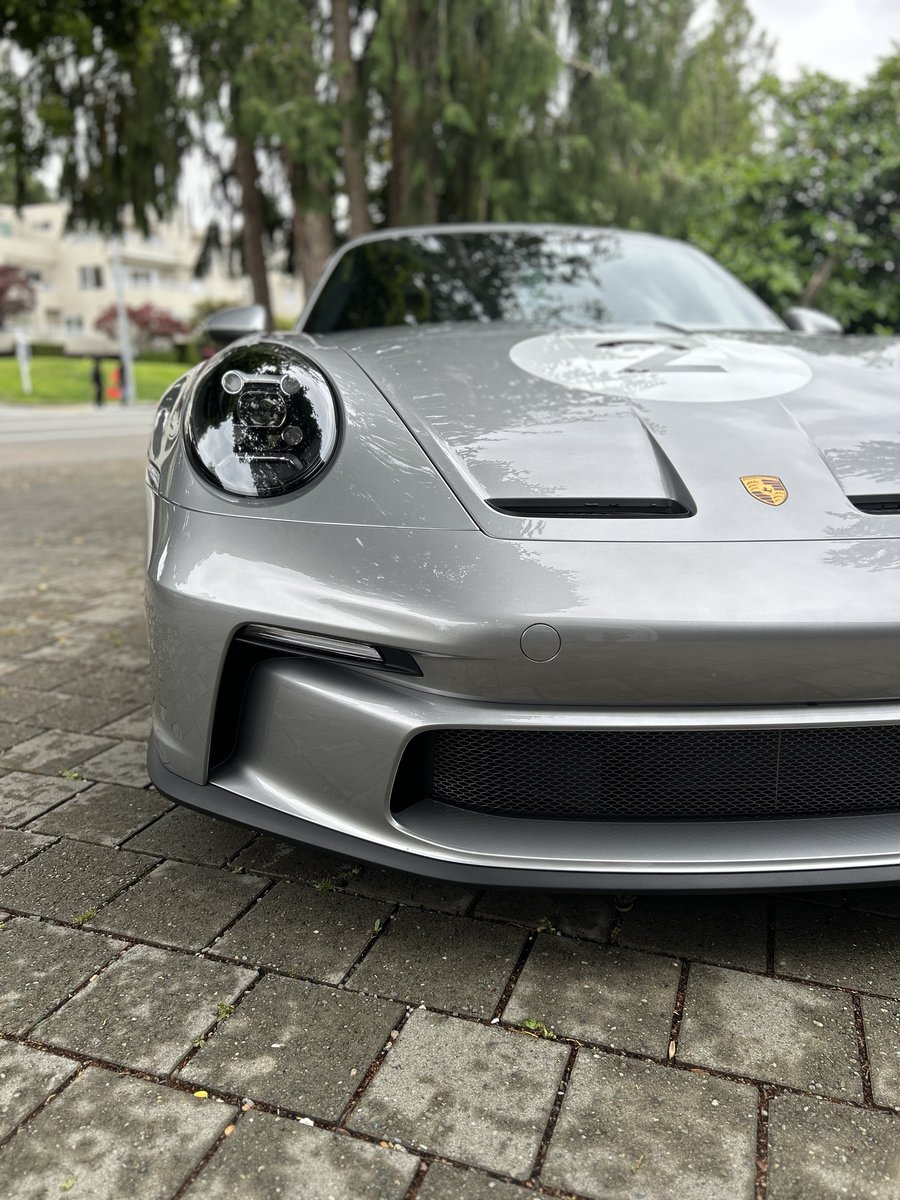 Ghost Guard on an owner's silver sports car