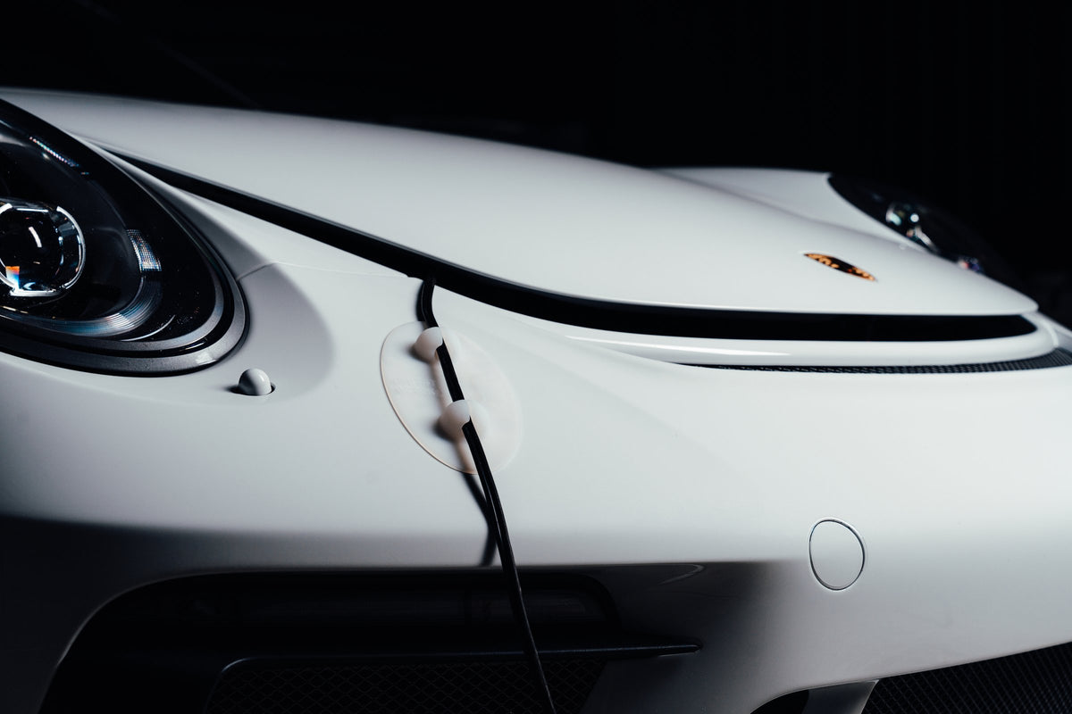 Ghost Guard on the front of a white sports car